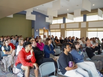 photo of people seated in lecture hall