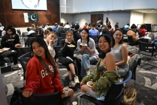 photo of group of people sitting together