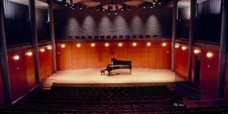 Piano sitting on a stage