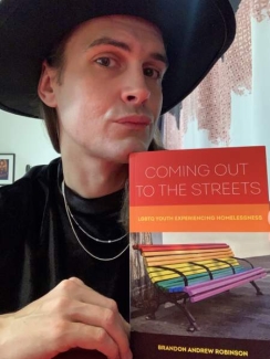 man holding book