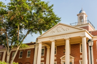 photo of building with columns and cupola