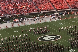 marching band at a football stadium, photo