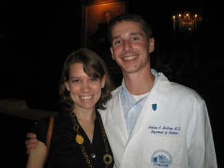 photo of woman and man in white doctor coat