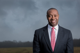 photo of man, with cloudy sky background