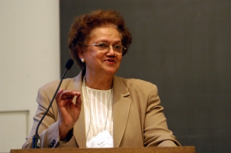 photo of woman at lectern with microphone