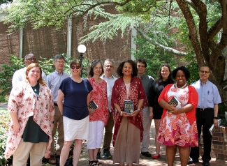 Group photo of 11 people, outdoors