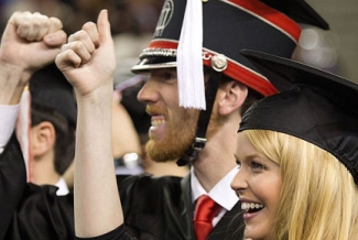 man and woman graduating