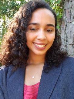 headshot photo of woman, outdoors