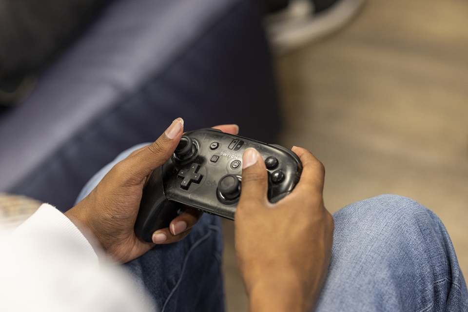 detail of photo of students in Tate Center Center Game room, 2023