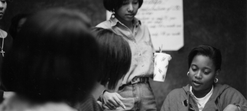 b/w photo of women, indoors