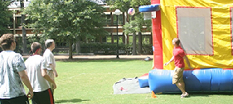 people with inflated bounce house