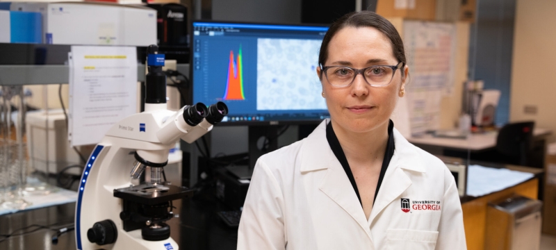 photo of woman in lab with computer 