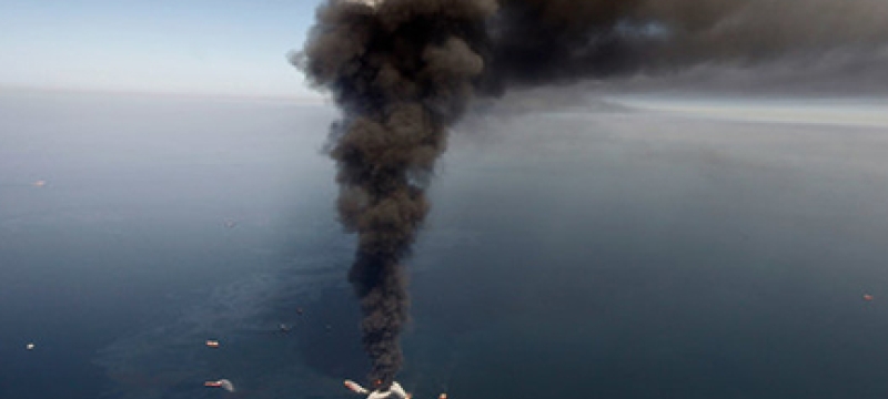 smoking oil rig in the Gulf of Mexico