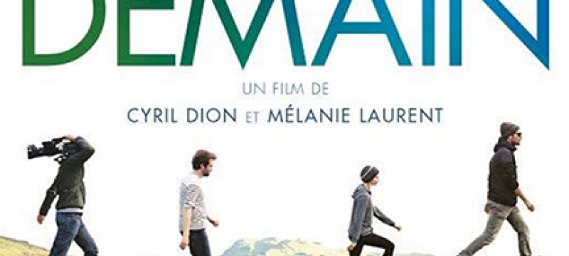 four people walking outside