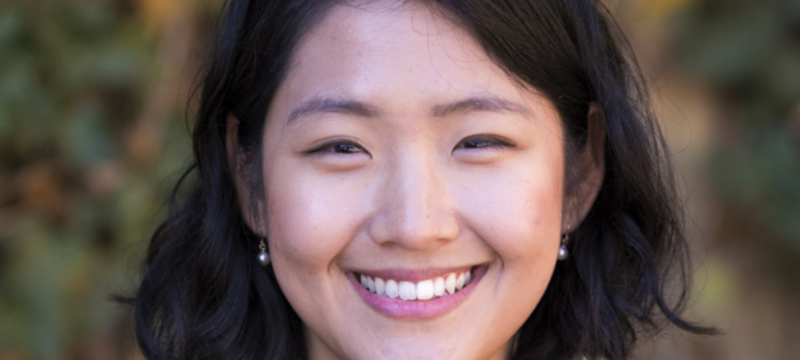 headshot photo of woman, outdoors