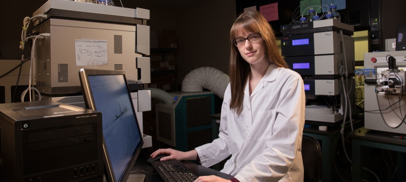 photo of woman in a lab with computer