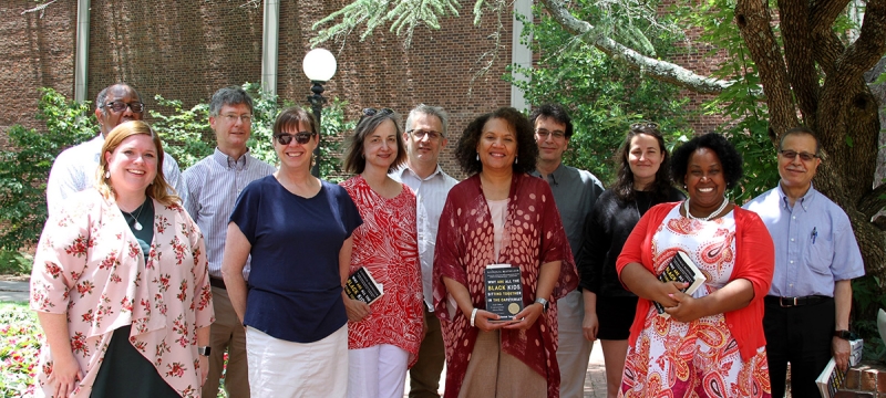 Group photo of 11 people, outdoors