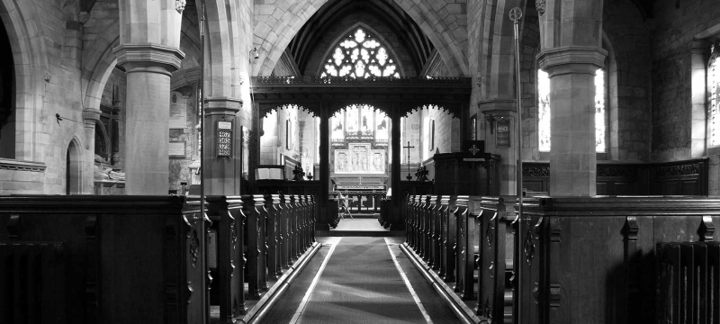 black and white photo of empty church sanctuary