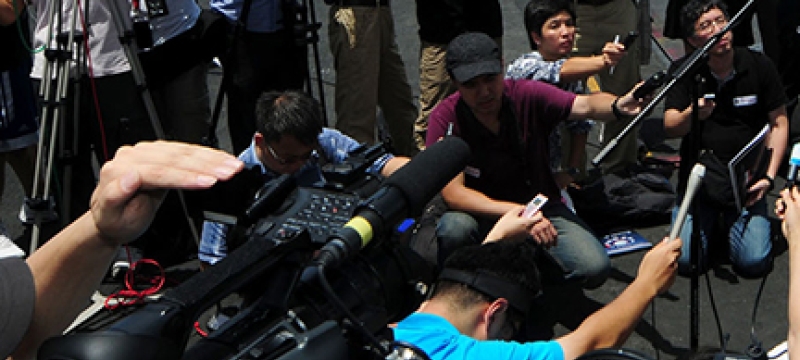 people, cameras and microphones