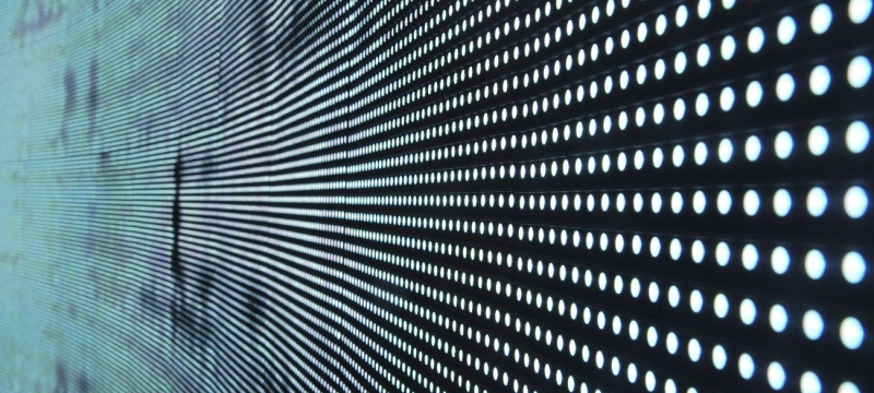 graphic with white dots on black field, diminishing perspective,