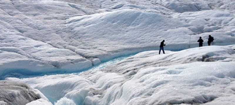 glacier melting, with people