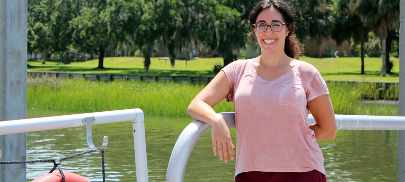 photo of woman on dock, day
