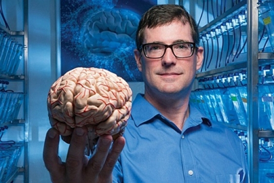 man holding brain