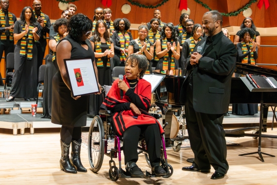 group photo of ensemble, three people in foreground