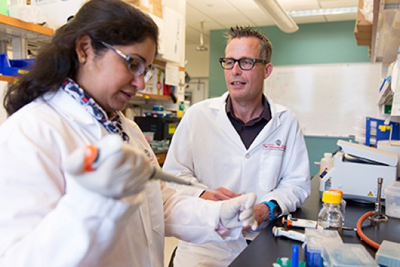 man and woman in lab