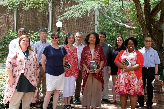 Group photo of 11 people, outdoors