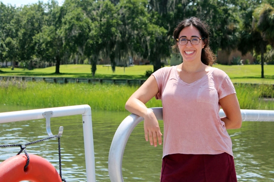 photo of woman on dock, day