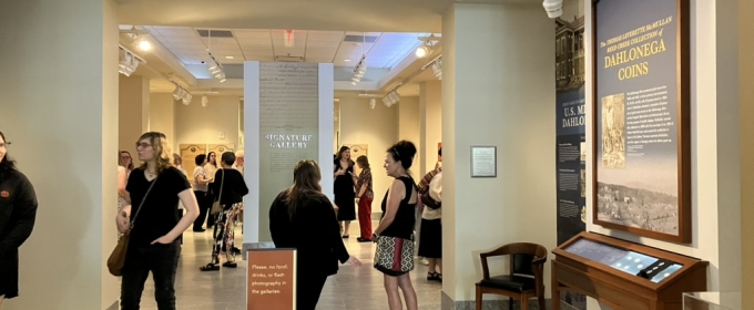 photo of people and exhibits in gallery