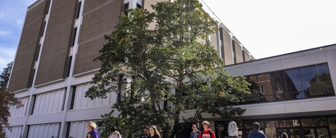 photo of building with students, day