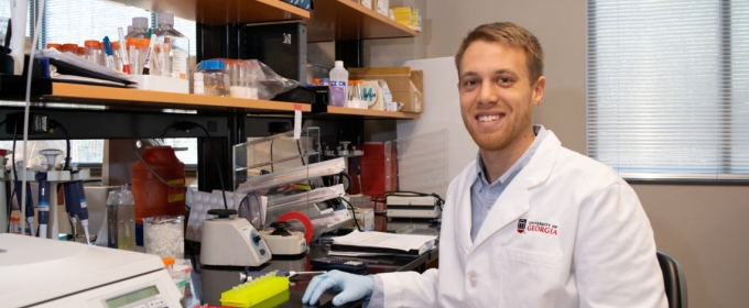 Photo of man in lab/office