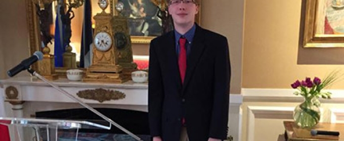 student in ornate room