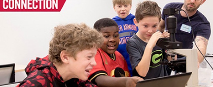 photo of kids with microscope and computer