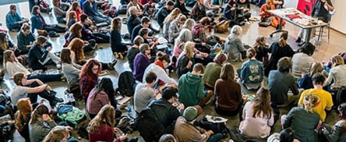 photo of room with students and speaker