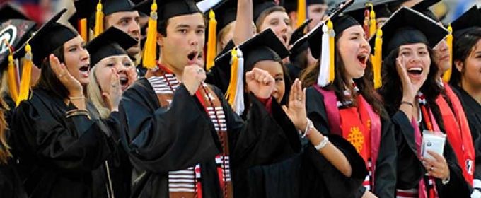 photo of grads in caps and gowns