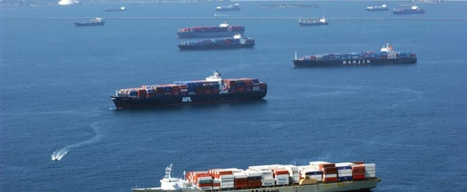 photo of container ships in ocean