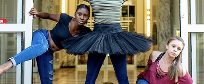 photo of four dancers posed at the library door