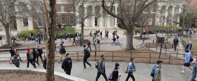 photo of building with students in the foreground 