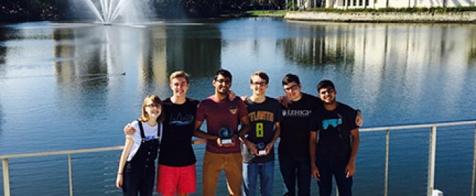 six people in front of water, photo