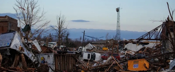 photo of damaged buildings and debris, day