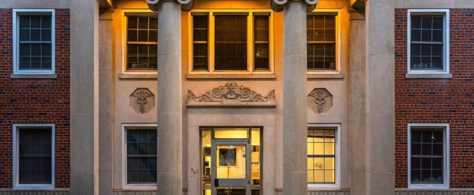 photo of building facade, with columns