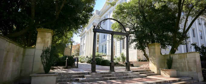 photo of arch and buildings, day