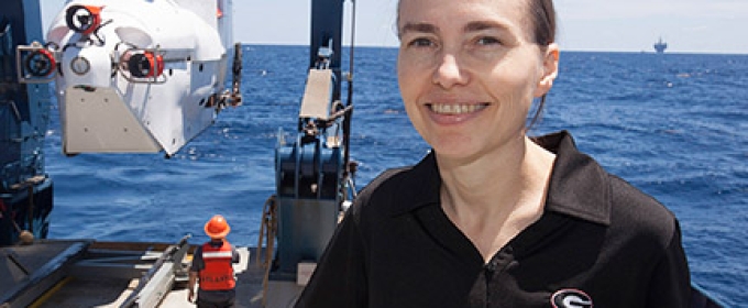 woman at sea on research vessel