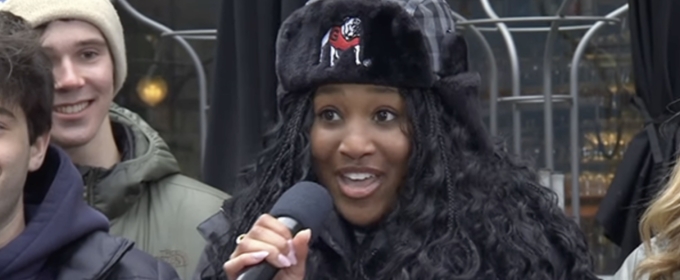 photo of woman with winter hat and microphone