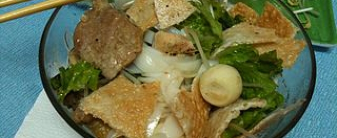 noodle soup with greens, beef and quail eggs