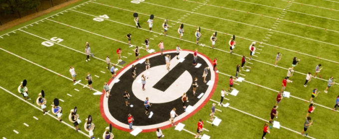 aerial photo of marching band practice