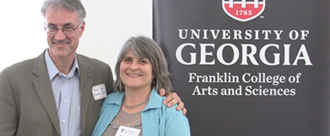 photo of man and woman with plaque